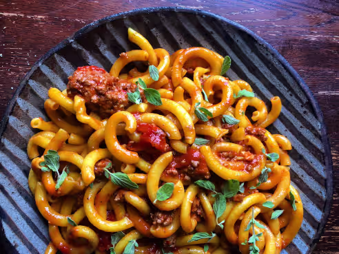 Cucina 24 signature dishes Tasting MenuHouse-made Pasta with Local IngredientsWood-Fired Meats and Vegetables